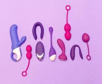 Accessible sex toys on a purple background